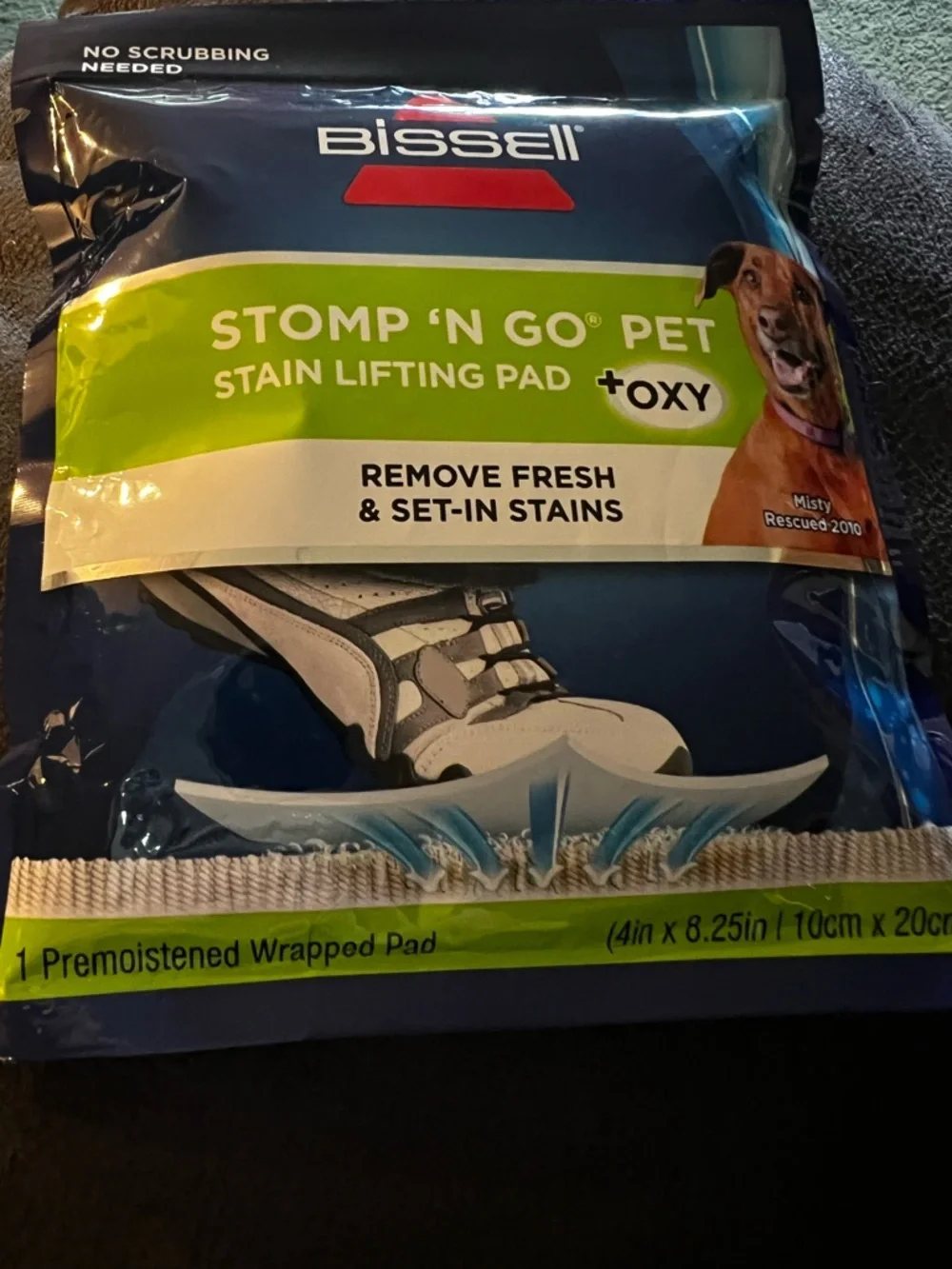 Bissell Blue and Green Stomp 'N Go Pet Stain Lifting Pad.